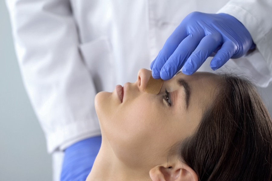 A woman with a deviated septum going to an ENT doctor