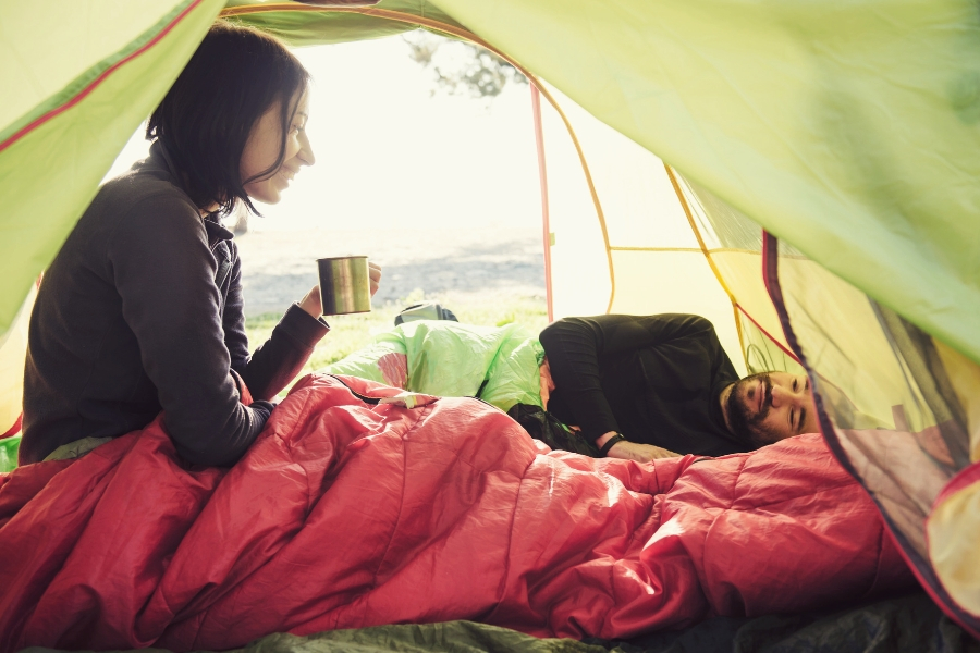 husband and wife camping