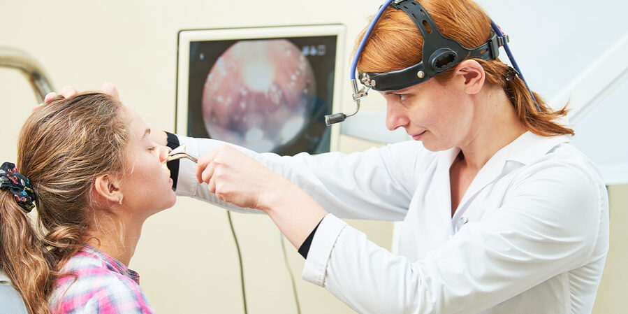 Ear, nose, throat examining. ENT doctor with a child patient and